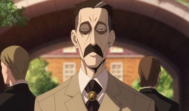 The character Donovan Desmond with a striking mustache and a neutral expression looking at the camera.