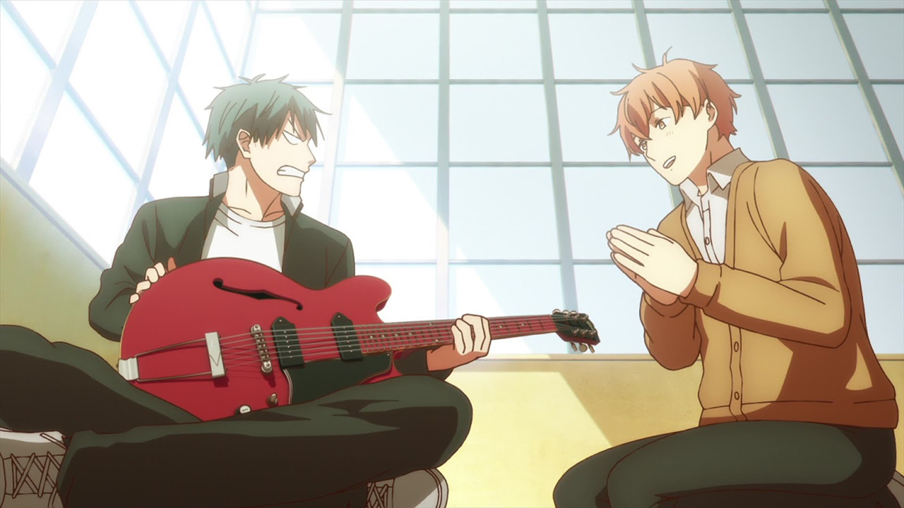 Personagens principais do anime Given discutindo enquanto um deles segura uma guitarra vermelha