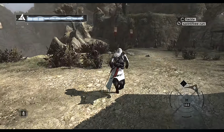 Game character running on a stone floor with several rocks around him.