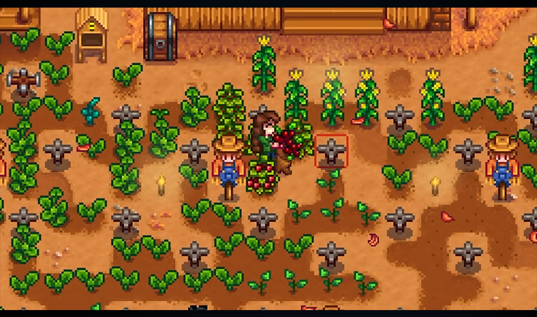 Personaje del juego organizando su plantación con espantapájaros.