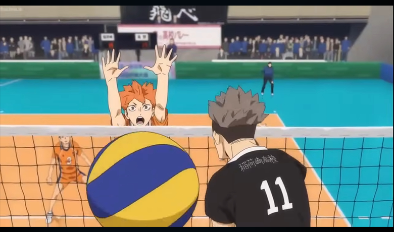 Image shows the character in the middle of a volleyball match making a block